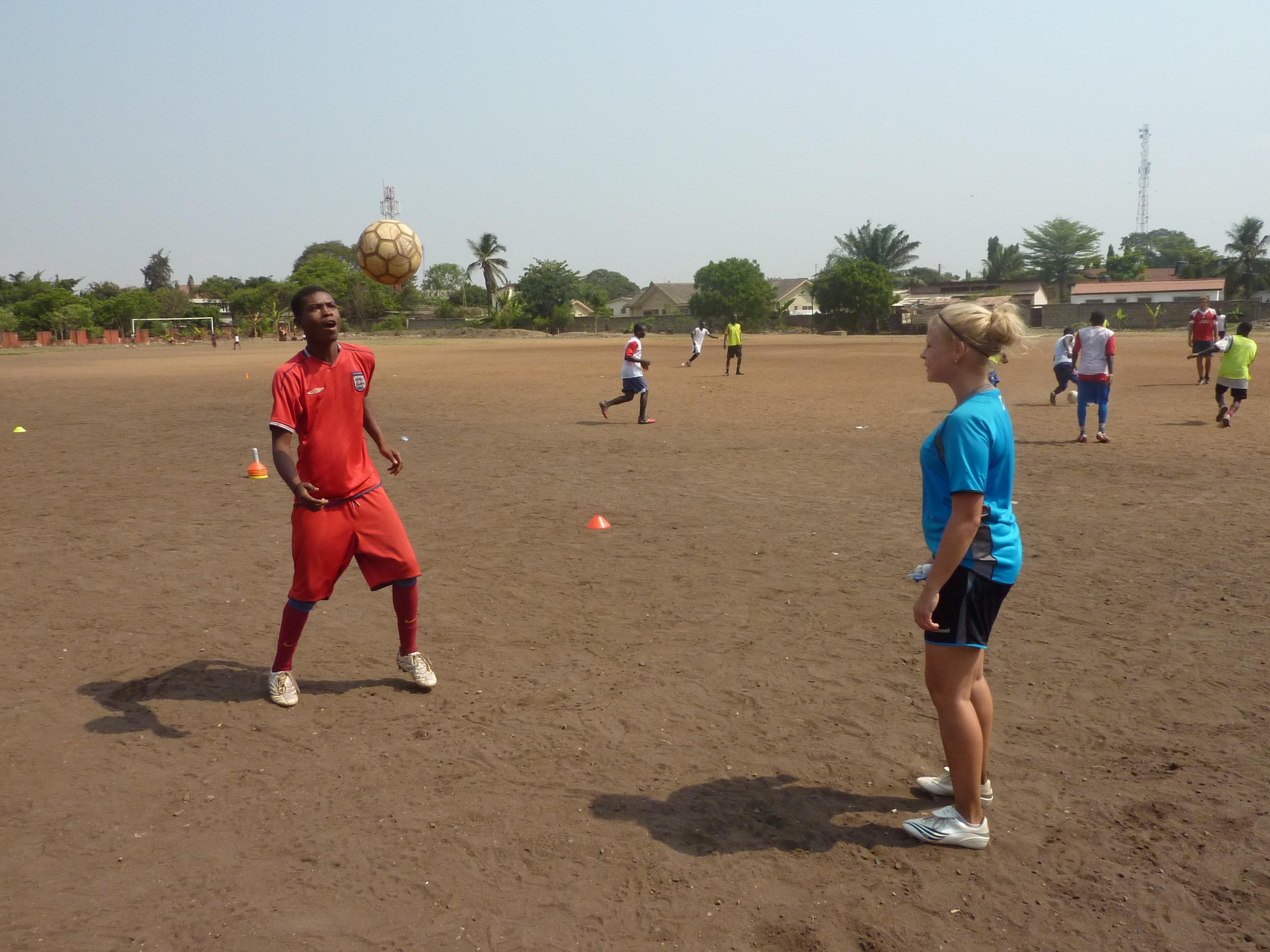 A Projects Abroad volunteer gains hands-on football coaching experience in Ghana A woman volunteers as a football coach in Ghana to share her skills with others